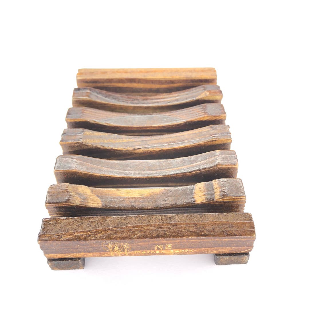 Wooden soap holder for handmade soap bars.