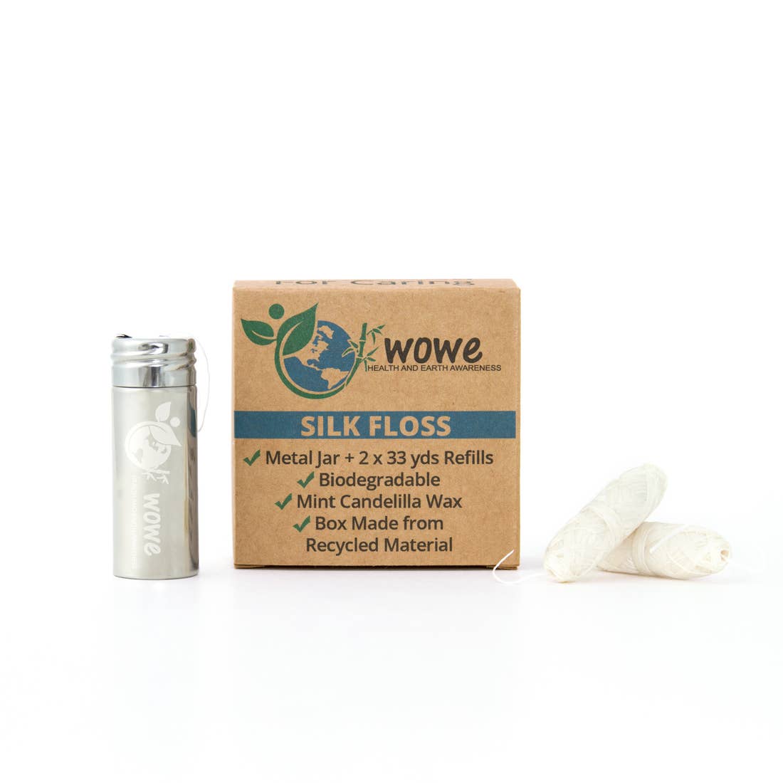 Natural silk dental floss with refillable stainless steel container, eco-friendly.