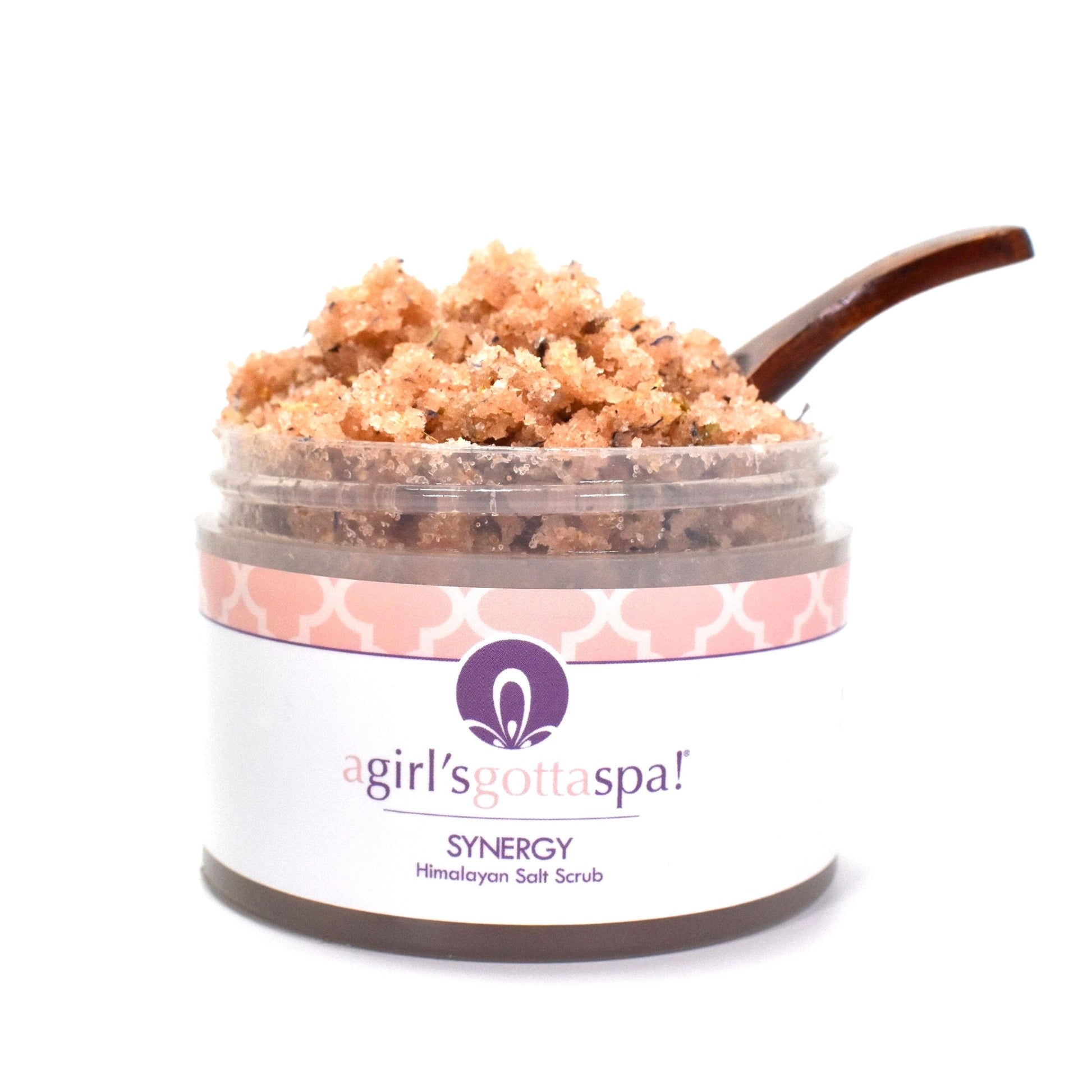 Close-up of Synergy Himalayan Salt Body Scrub with visible salt texture and wooden spoon – Gentle exfoliation for radiant skin.