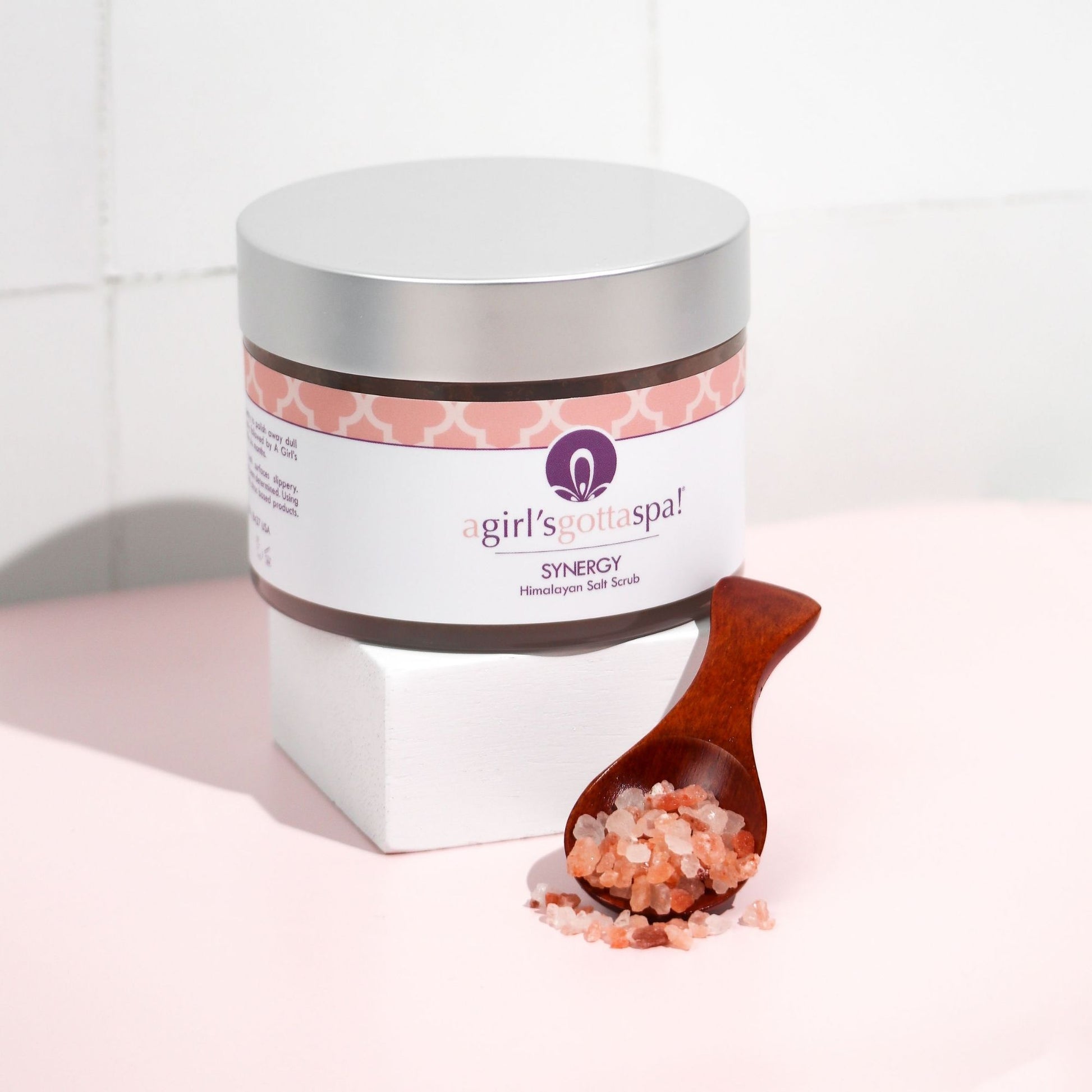 Synergy Himalayan Salt Body Scrub with lid and wooden spoon – Spa-quality natural skincare product.